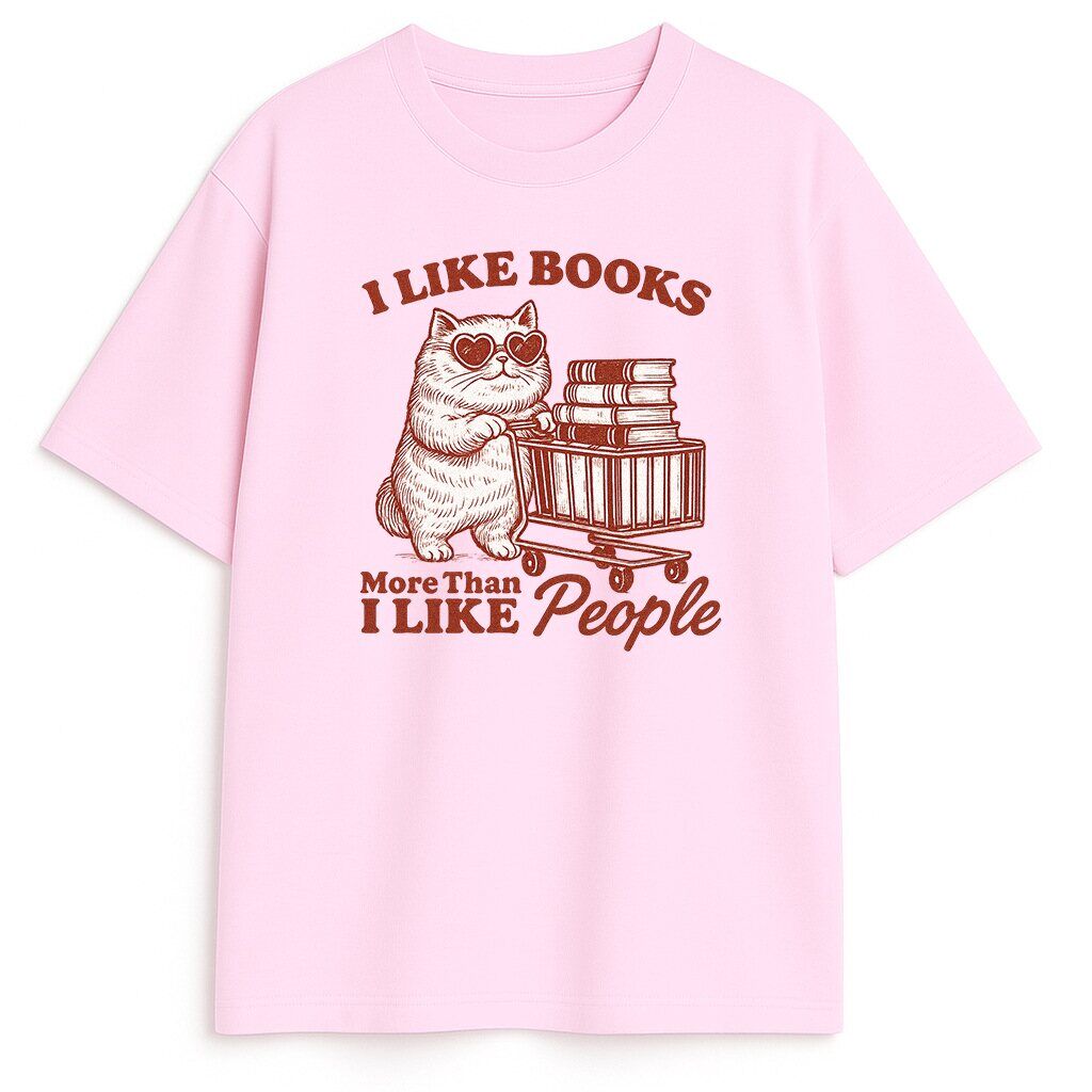 Różowy wariant - pastelowy klimat Różowy t-shirt z kotem dla miłośników czytania - subtelny klimat vintage i zabawny przekaz o miłości do książek
